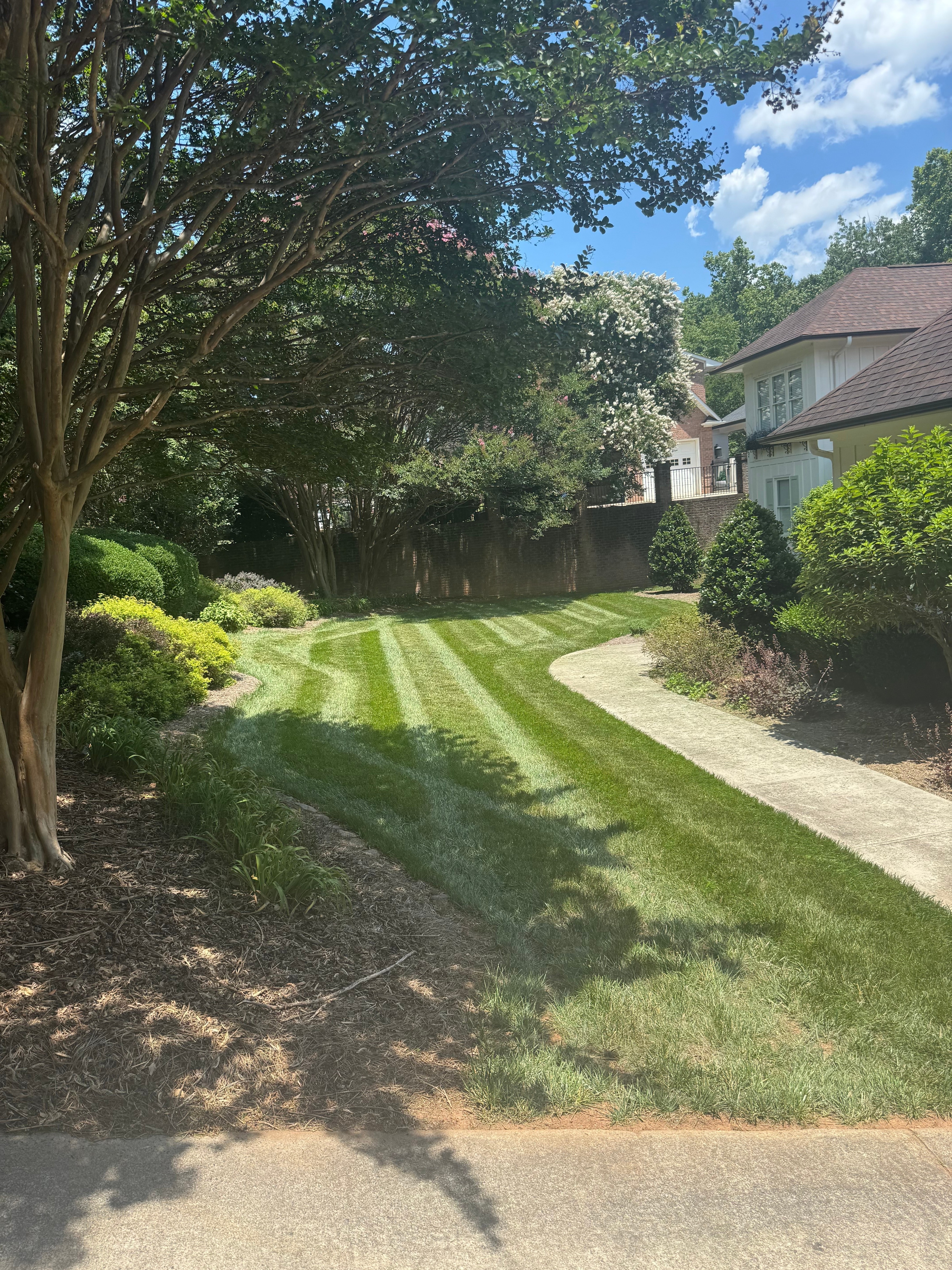 Lawn care work in Hickory, NC by Oasis Property Management